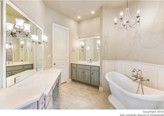 bathroom featuring a bath and vanity