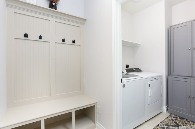 mudroom featuring washing machine and dryer