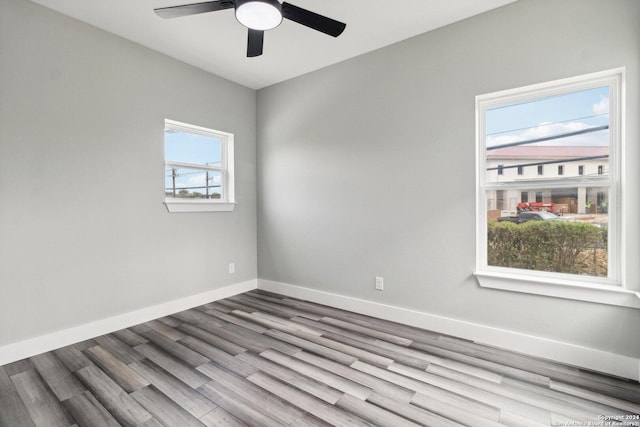 159 E Davis Ct Unit 102, San Antonio, TX 78209 - empty room featuring baseboards, a ceiling fan, and wood finished floors