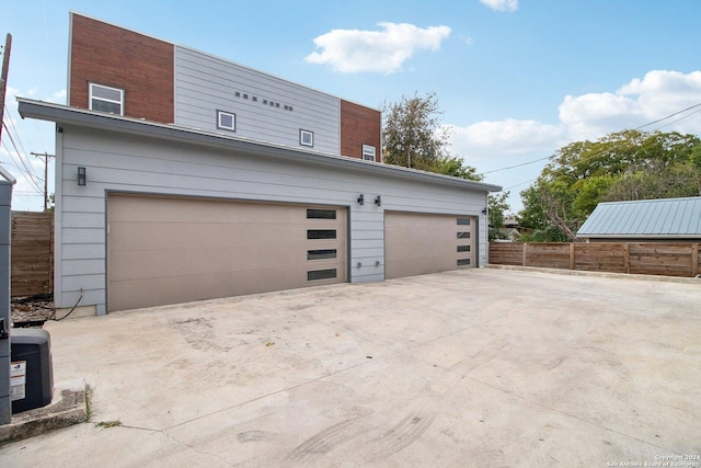 159 E Davis Ct Unit 102, San Antonio, TX 78209 - garage with fence and driveway