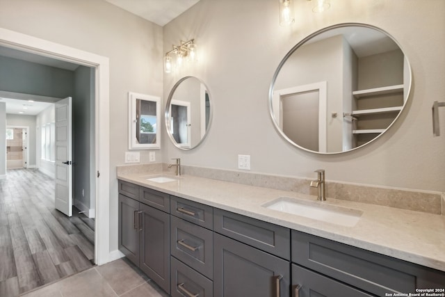 bathroom featuring vanity and hardwood / wood-style floors