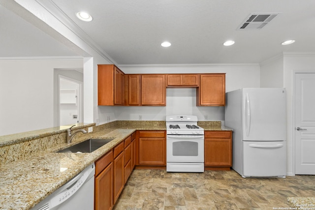 kitchen featuring white appliances, light stone countertops, sink, and ornamental molding