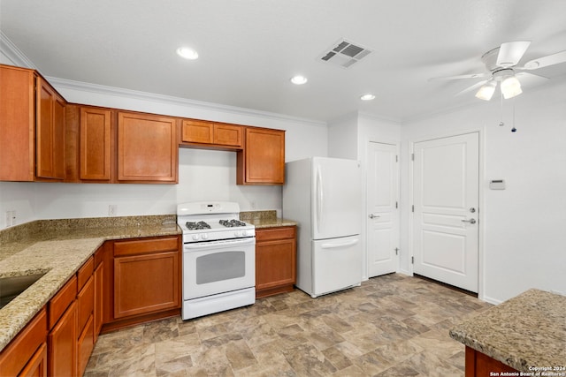 kitchen featuring white appliances, light stone counters, ornamental molding, and ceiling fan