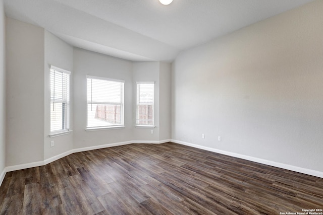 8116 Chasemont Ct, Converse, TX 78109 - empty room featuring healthy amount of natural light, dark wood-type flooring, and baseboards