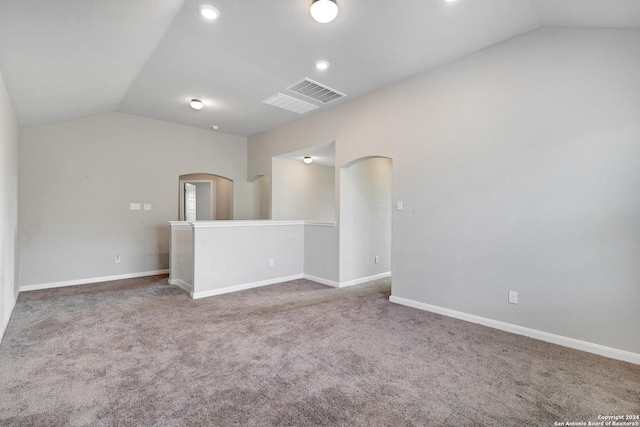 8116 Chasemont Ct, Converse, TX 78109 - carpeted empty room with lofted ceiling, arched walkways, baseboards, and recessed lighting