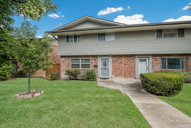 view of front of property with a front lawn