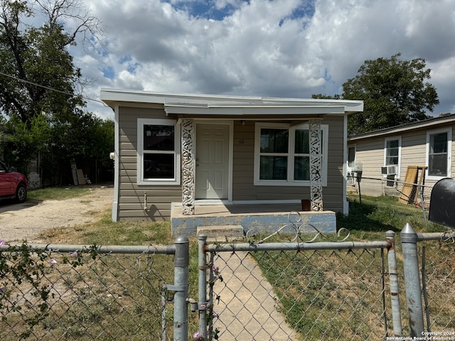 view of front of home featuring cooling unit