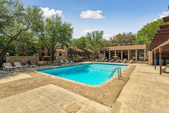 view of pool featuring a patio