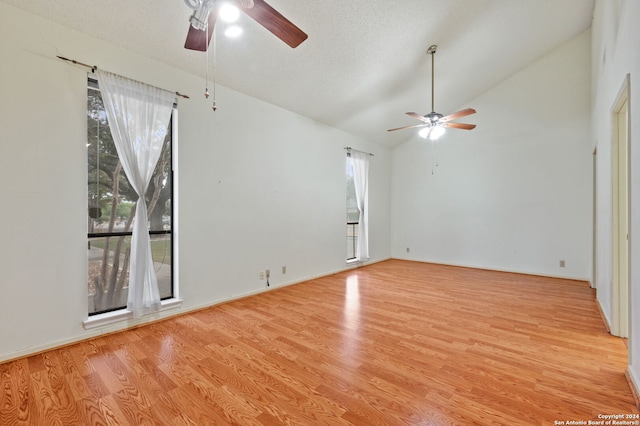 spare room featuring light hardwood / wood-style floors, a textured ceiling, and ceiling fan