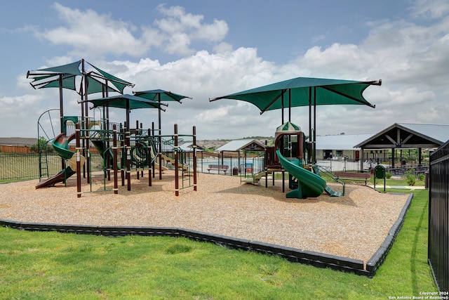 view of play area featuring a lawn