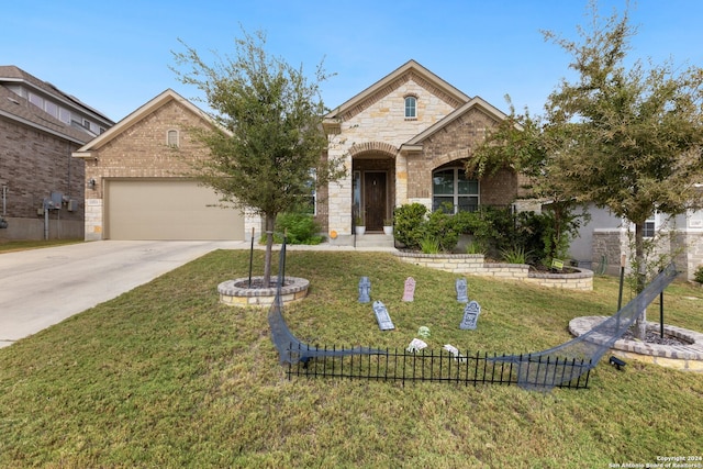 view of front facade with a front yard