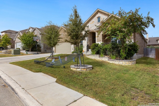 obstructed view of property with a front lawn