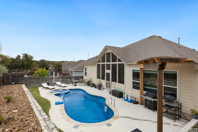 view of pool featuring a patio area