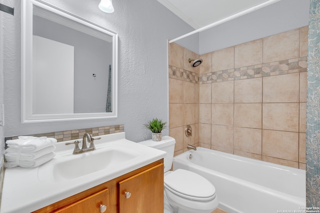 full bathroom with backsplash, shower / tub combo, toilet, vanity, and crown molding