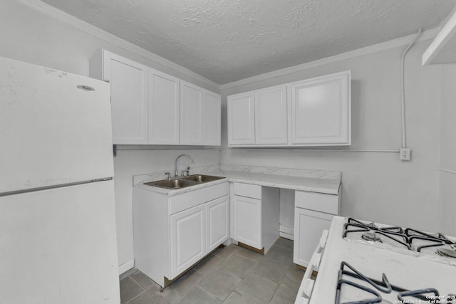 811 General Mcmullen Dr, San Antonio, TX 78237 - kitchen featuring white cabinets, a sink, white appliances, light countertops, and ornamental molding