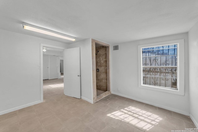 811 General Mcmullen Dr, San Antonio, TX 78237 - unfurnished bedroom with baseboards and visible vents