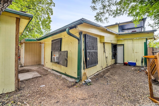 view of home's exterior with cooling unit