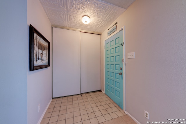 view of tiled foyer entrance