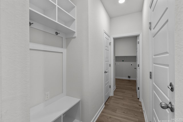 mudroom with hardwood / wood-style floors