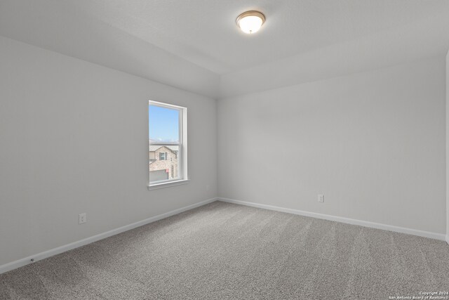 empty room featuring carpet floors