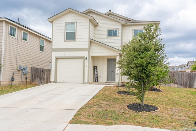 front of property with a garage and a front lawn