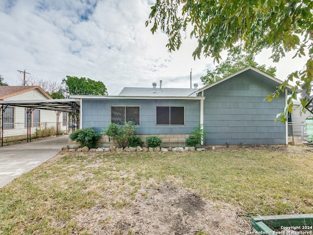 ranch-style house featuring a front lawn