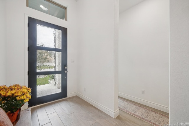 entrance foyer with light hardwood / wood-style flooring