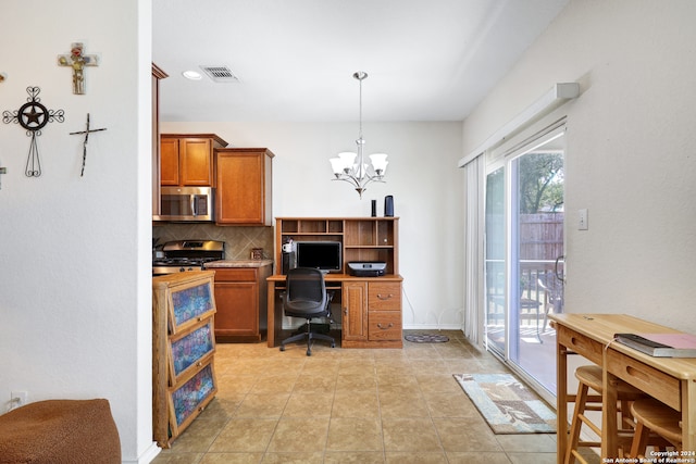 office featuring a notable chandelier and light tile patterned floors