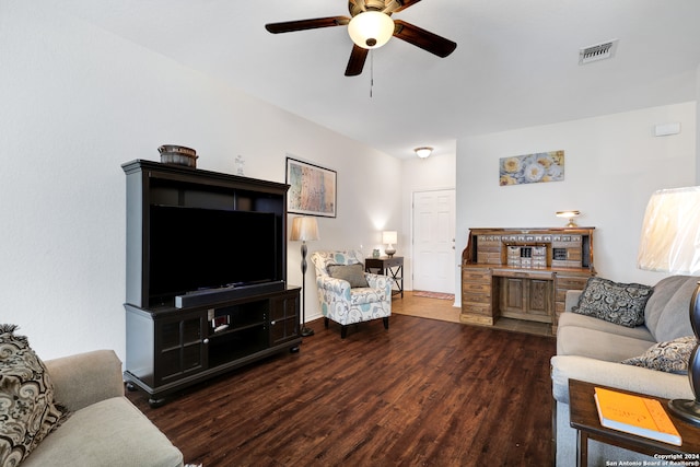 living room featuring dark hardwood / wood-style floors and ceiling fan