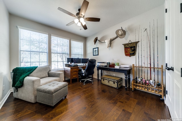 home office featuring dark hardwood / wood-style flooring, a textured ceiling, ceiling fan, and a wealth of natural light