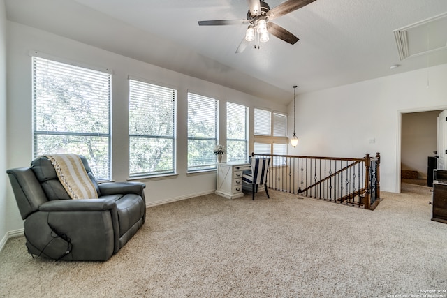 sitting room featuring ceiling fan and carpet floors