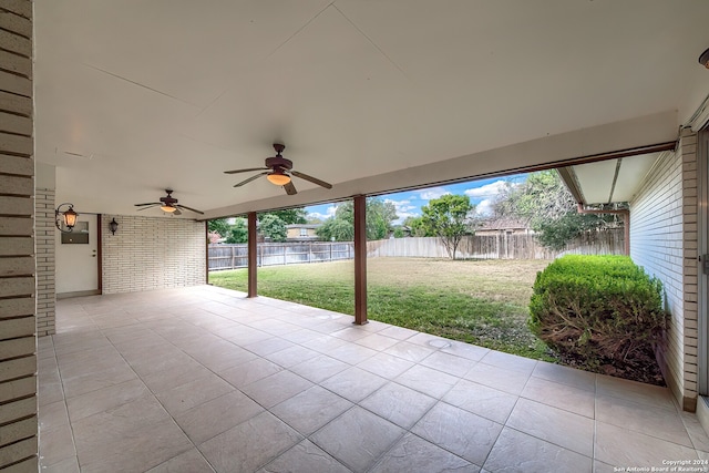 view of patio featuring ceiling fan