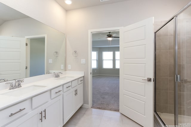 bathroom featuring vanity, walk in shower, tile patterned floors, and ceiling fan