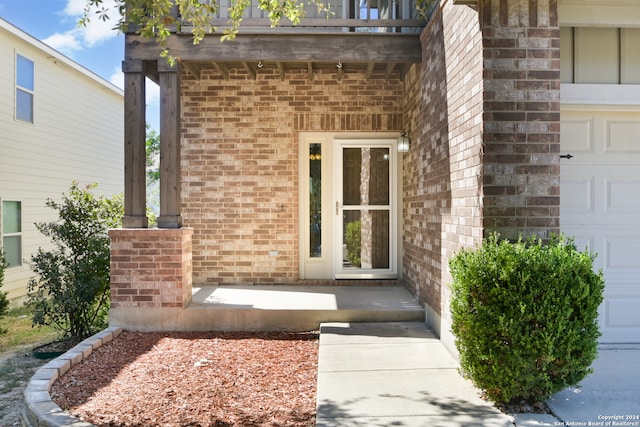 property entrance featuring a garage