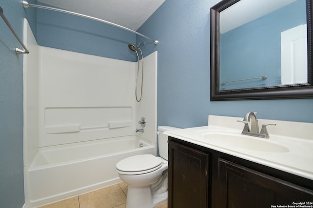 full bathroom featuring vanity, toilet, washtub / shower combination, and tile patterned flooring