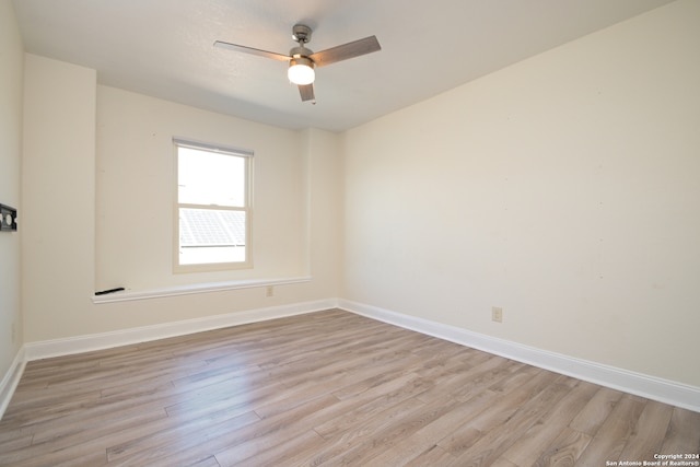 unfurnished room with light hardwood / wood-style floors and ceiling fan