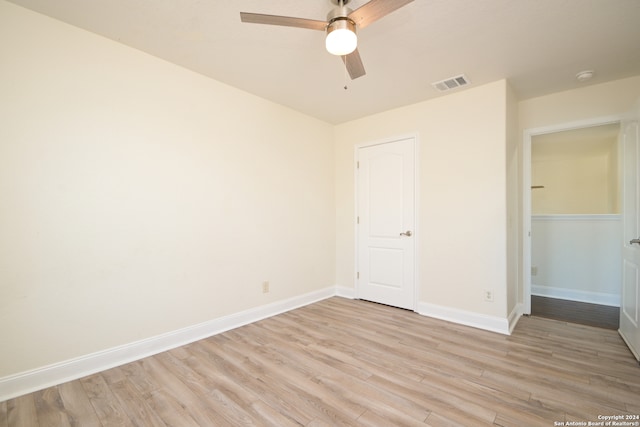 unfurnished bedroom featuring light hardwood / wood-style floors and ceiling fan