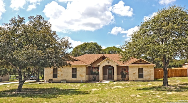 view of front of house with a front lawn