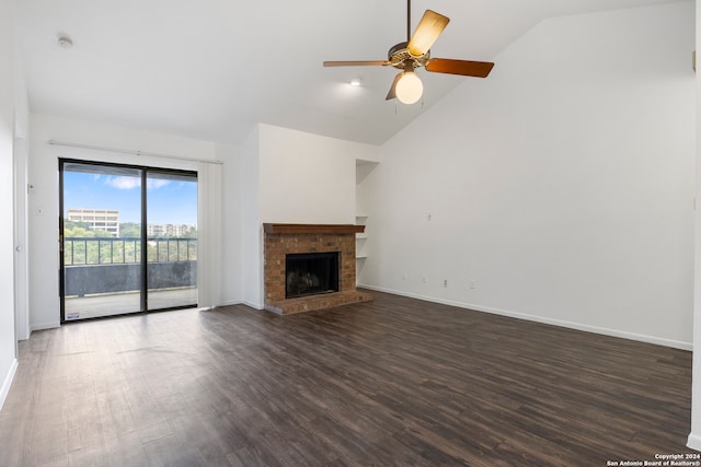 unfurnished living room featuring ceiling fan, a brick fireplace, high vaulted ceiling, and dark hardwood / wood-style flooring