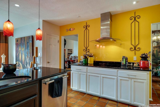 kitchen featuring stainless steel dishwasher, wall chimney exhaust hood, white cabinetry, and decorative light fixtures