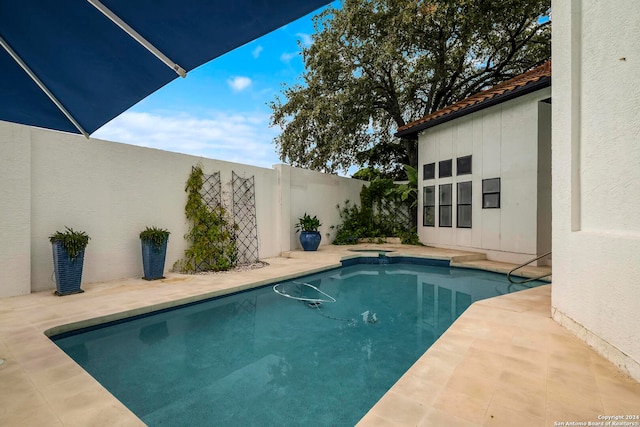 view of pool with a patio area