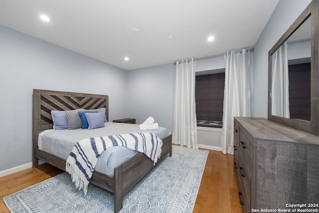 bedroom featuring hardwood / wood-style floors