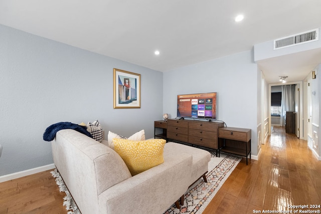 living room with hardwood / wood-style floors