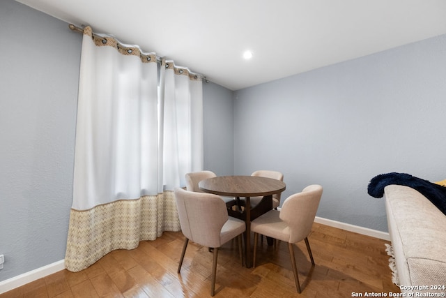 dining room featuring wood-type flooring