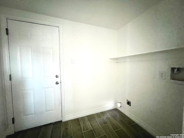 laundry area featuring hookup for a washing machine, hookup for an electric dryer, and dark hardwood / wood-style floors