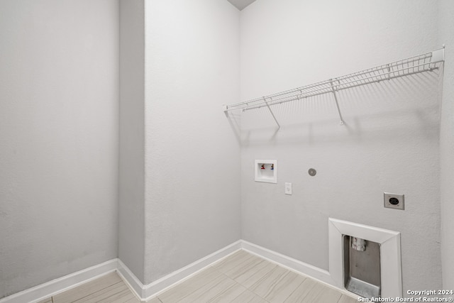 laundry room featuring hookup for a washing machine, electric dryer hookup, and gas dryer hookup