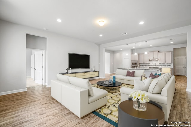 living room featuring light hardwood / wood-style flooring