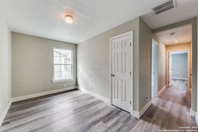 1703 Allende, San Antonio, TX 78237 - bathroom with vanity, a tile shower, and toilet