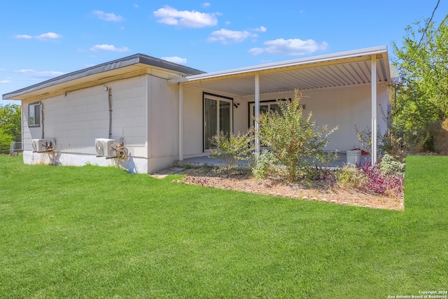 view of home's exterior featuring a lawn