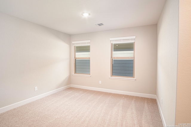 unfurnished room with carpet